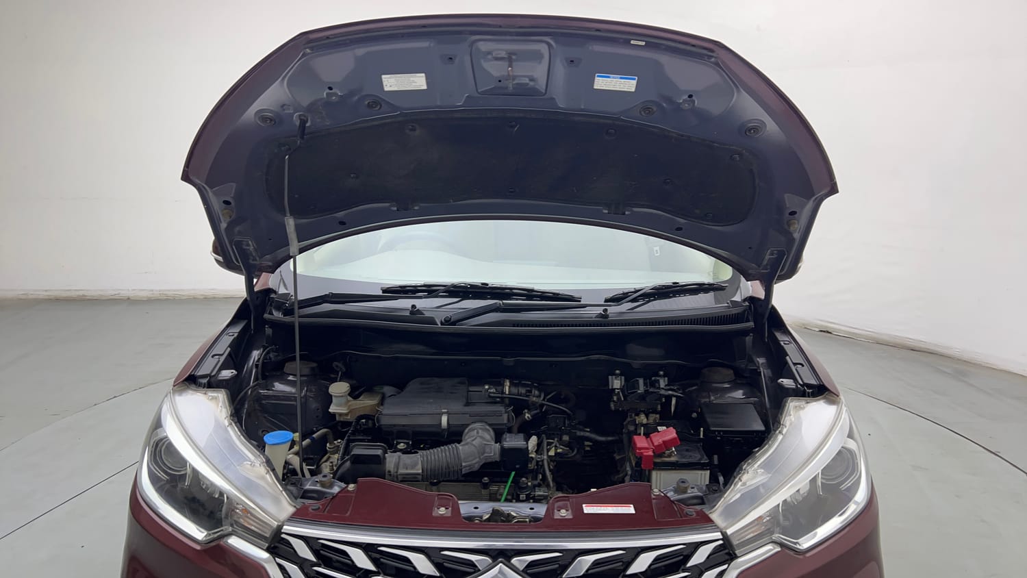 Used 2023 Maruti Suzuki Ertiga VXi (O) Petrol Manual engine ENGINE & BONNET OPEN FRONT VIEW