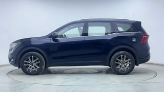 Used 2024 Mahindra XUV700 AX7 Luxury Pack Petrol AT 7 STR Petrol Automatic exterior LEFT SIDE VIEW
