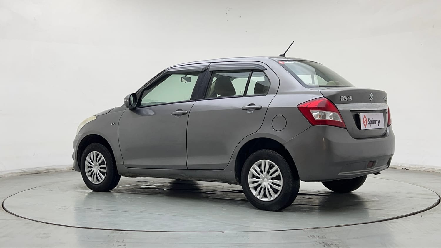 Used 2014 Maruti Suzuki Swift Dzire VXI Petrol Manual exterior LEFT REAR CORNER VIEW