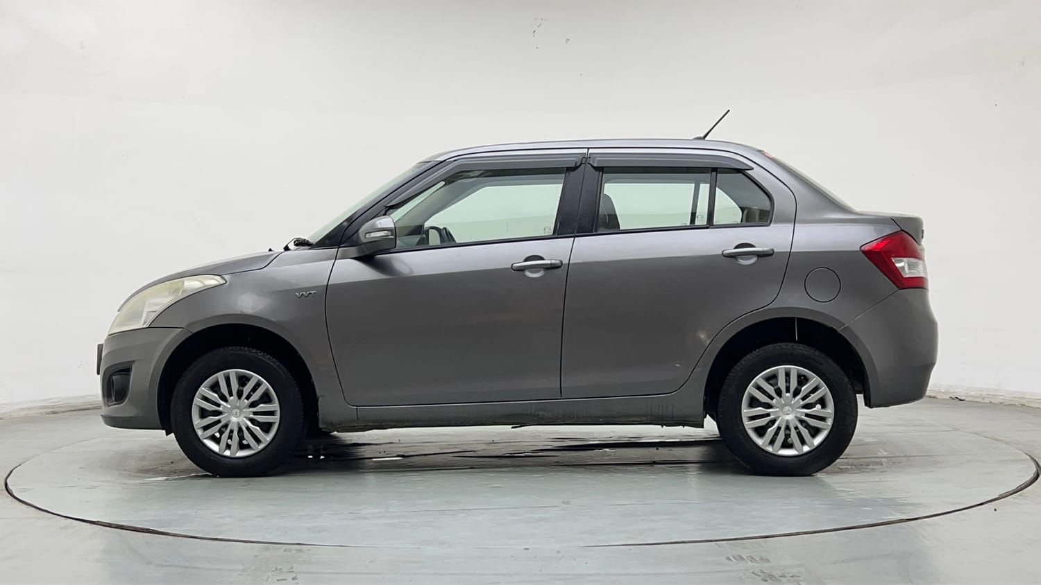 Used 2014 Maruti Suzuki Swift Dzire VXI Petrol Manual exterior LEFT SIDE VIEW