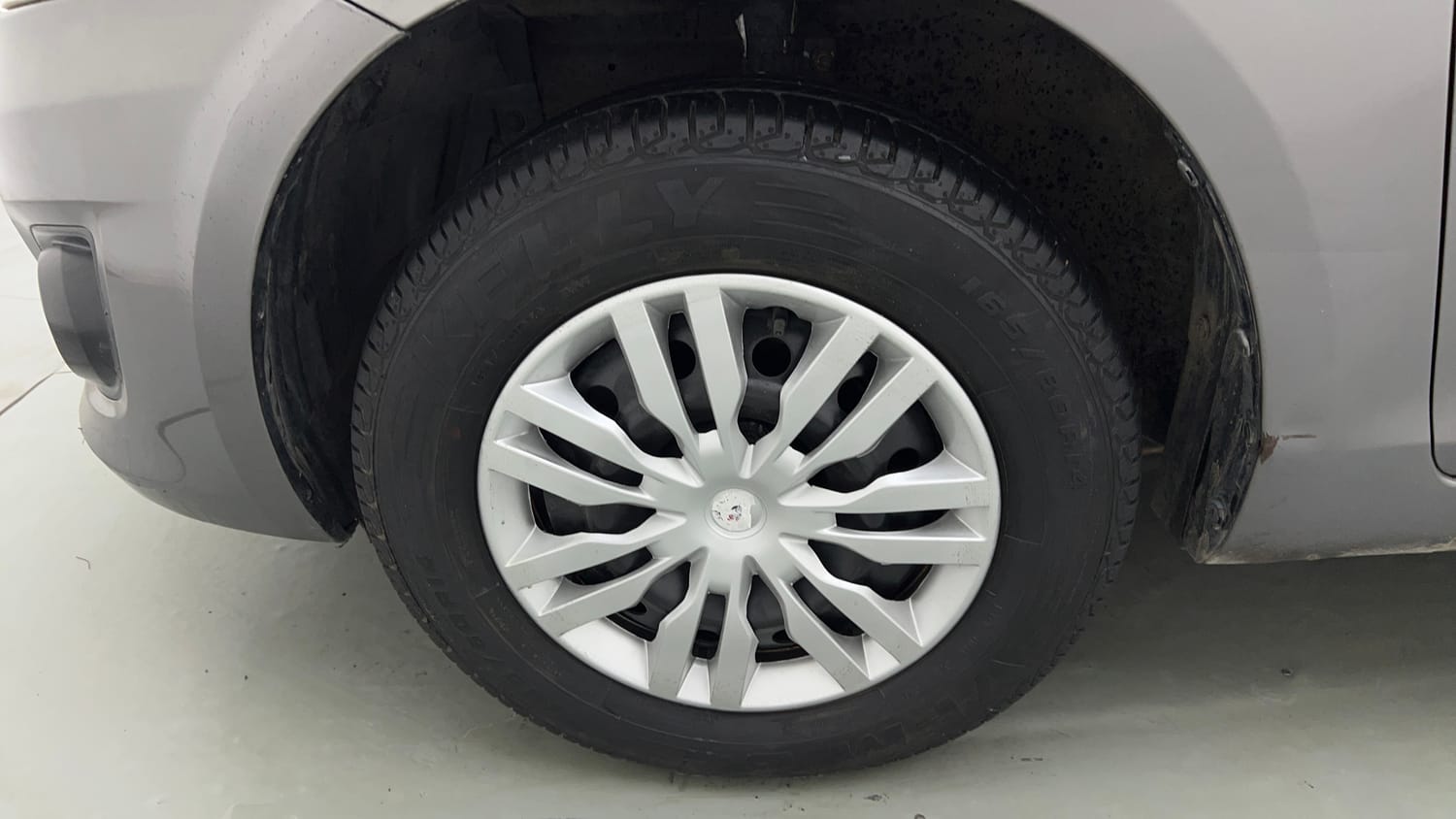 Used 2014 Maruti Suzuki Swift Dzire VXI Petrol Manual tyres LEFT FRONT TYRE RIM VIEW