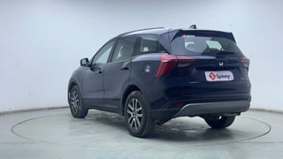 Used 2024 Mahindra XUV700 AX7 Luxury Pack Petrol AT 7 STR Petrol Automatic exterior LEFT REAR CORNER VIEW