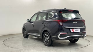 Used 2022 Kia Carens Luxury Plus 1.4 Petrol DCT 6 STR Petrol Automatic exterior LEFT REAR CORNER VIEW