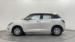 Used 2025 Maruti Suzuki Swift VXi Petrol Manual exterior LEFT SIDE VIEW