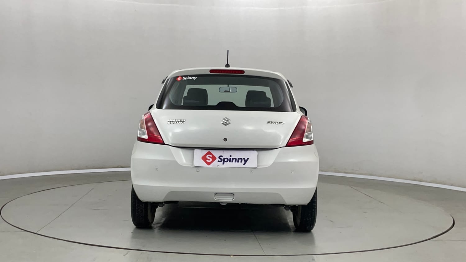 Used 2016 Maruti Suzuki Swift Lxi (O) Petrol Manual exterior BACK VIEW