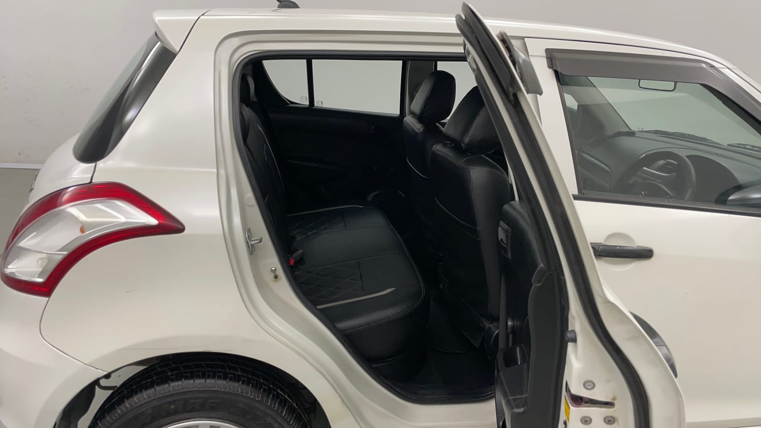 Used 2016 Maruti Suzuki Swift Lxi (O) Petrol Manual interior RIGHT SIDE REAR DOOR CABIN VIEW