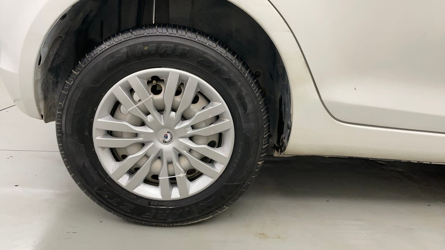 Used 2016 Maruti Suzuki Swift Lxi (O) Petrol Manual tyres RIGHT REAR TYRE RIM VIEW