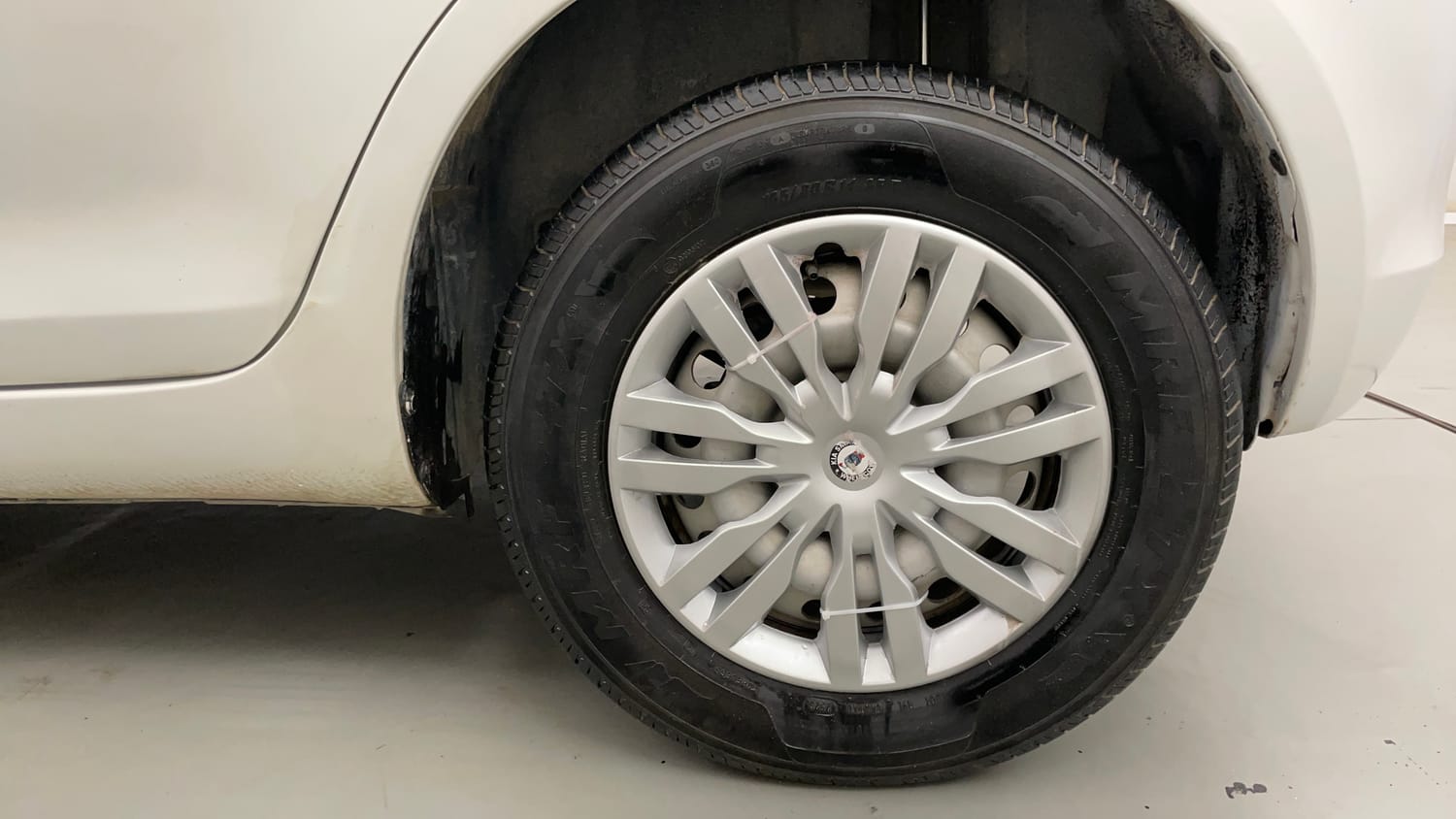 Used 2016 Maruti Suzuki Swift Lxi (O) Petrol Manual tyres LEFT REAR TYRE RIM VIEW