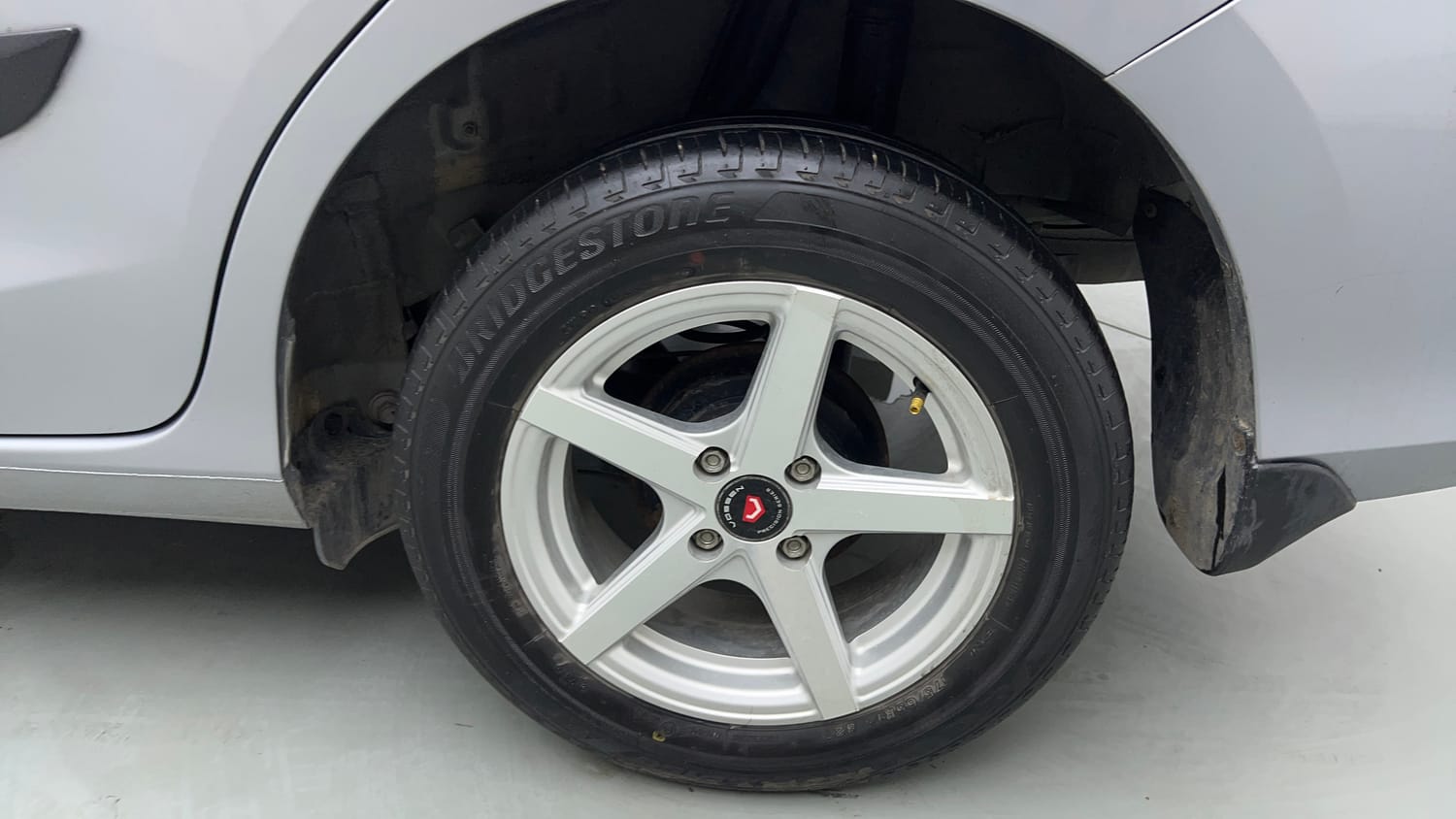 Used 2023 Honda Amaze S 1.2 Petrol CVT Petrol Automatic tyres LEFT REAR TYRE RIM VIEW