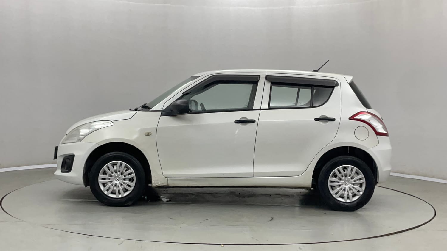 Used 2016 Maruti Suzuki Swift Lxi (O) Petrol Manual exterior LEFT SIDE VIEW