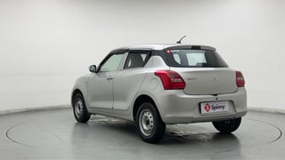Used 2023 Maruti Suzuki Swift LXi Petrol Manual exterior LEFT REAR CORNER VIEW