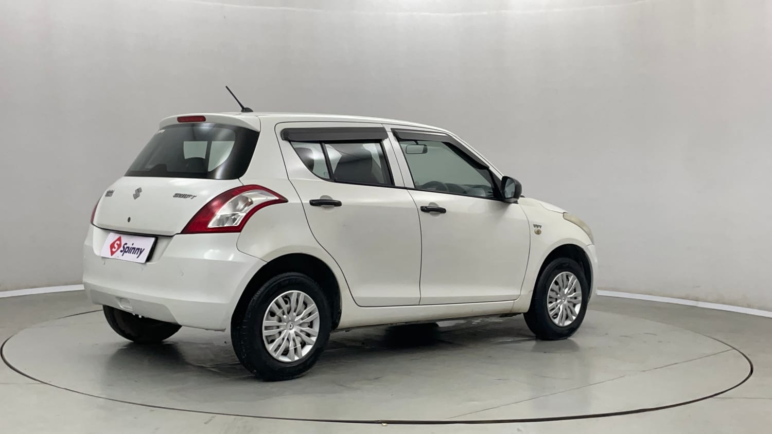 Used 2016 Maruti Suzuki Swift Lxi (O) Petrol Manual exterior RIGHT REAR CORNER VIEW