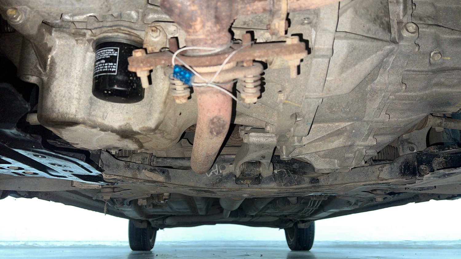 Used 2022 Maruti Suzuki Ertiga ZXi Plus Petrol Manual extra FRONT LEFT UNDERBODY VIEW