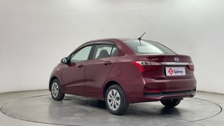 Used 2018 Hyundai Xcent E Plus Petrol Manual exterior LEFT REAR CORNER VIEW