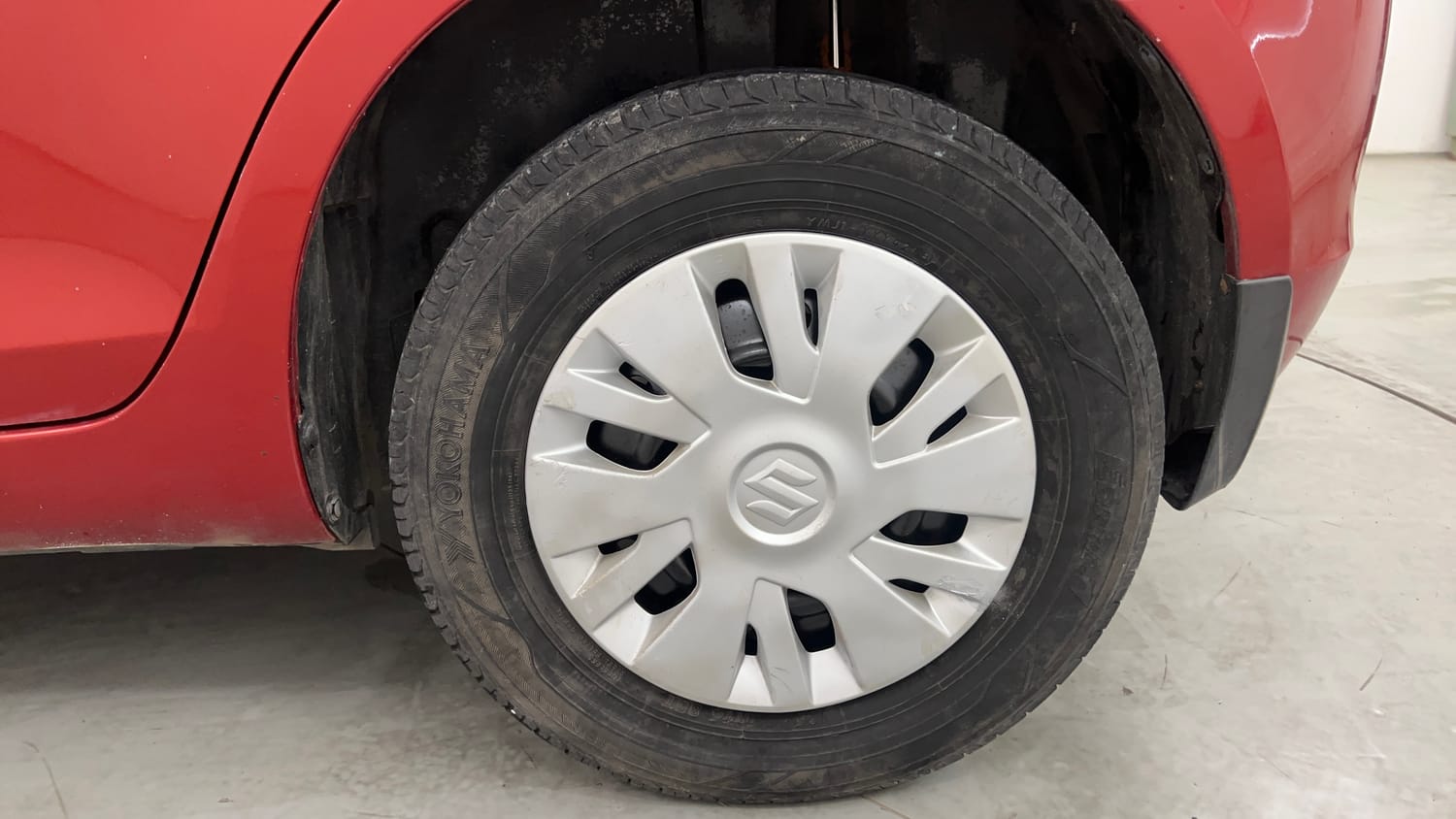 Used 2014 Maruti Suzuki Swift VXi Petrol Manual tyres LEFT REAR TYRE RIM VIEW