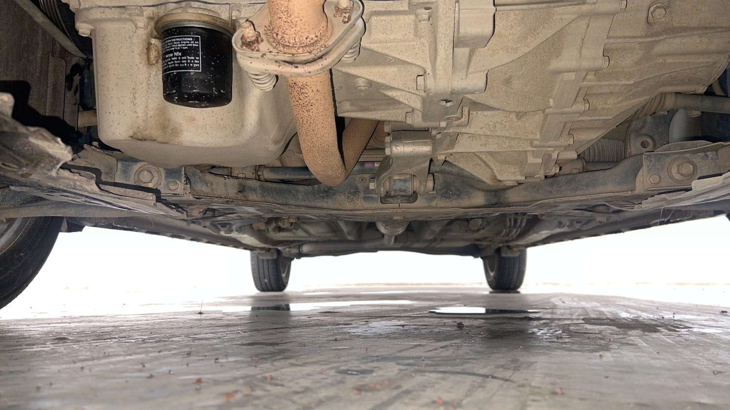 Used 2021 Maruti Suzuki XL6 Zeta MT Petrol Petrol Manual extra FRONT LEFT UNDERBODY VIEW
