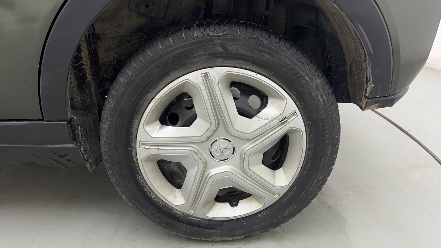 Used 2023 Tata Nexon XM (S) Petrol Manual tyres LEFT REAR TYRE RIM VIEW
