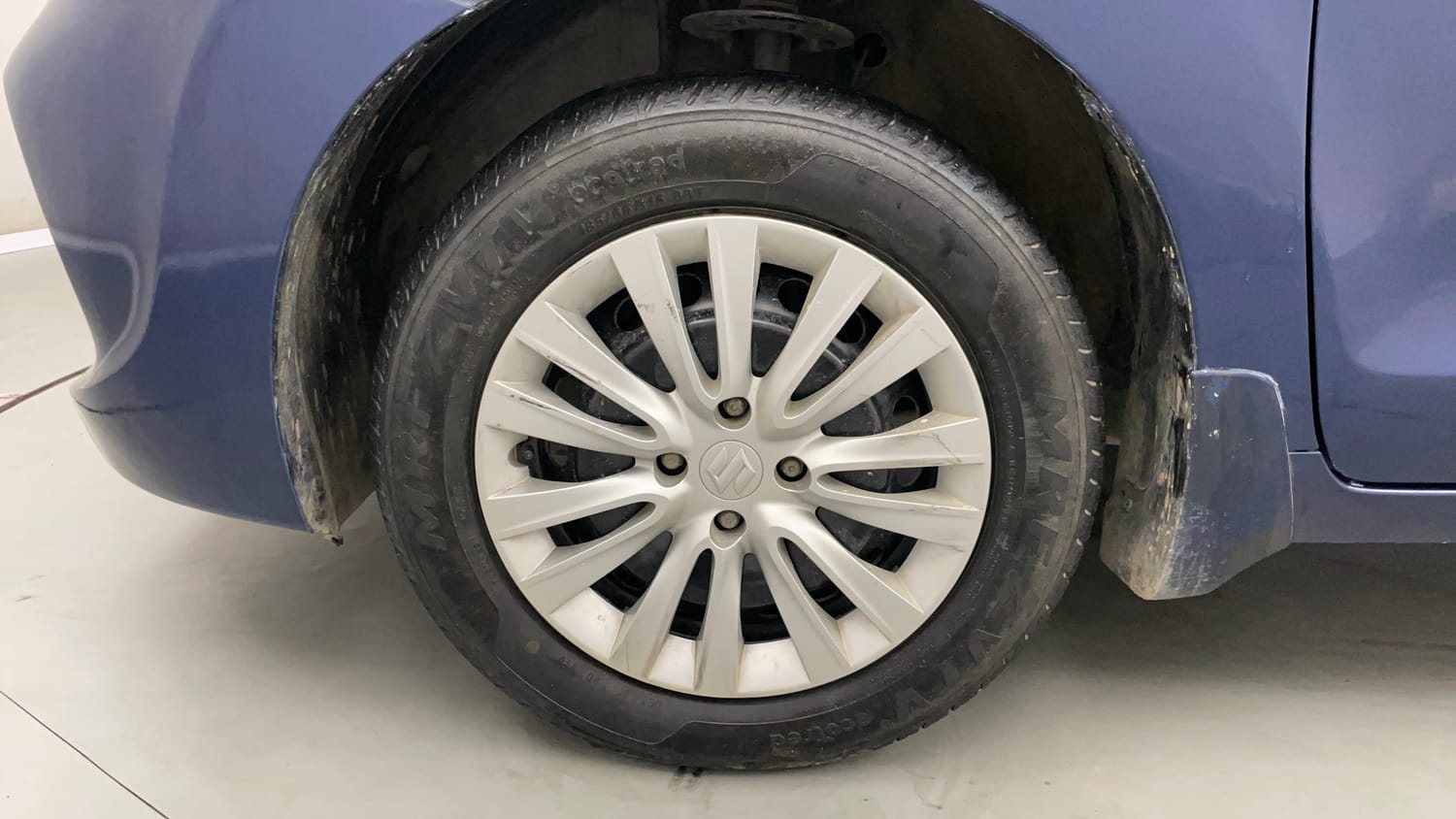 Used 2019 Maruti Suzuki Baleno Delta 1.2 Petrol Manual tyres LEFT FRONT TYRE RIM VIEW