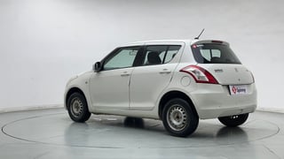 Used 2017 Maruti Suzuki Swift Lxi (O) Petrol Manual exterior LEFT REAR CORNER VIEW