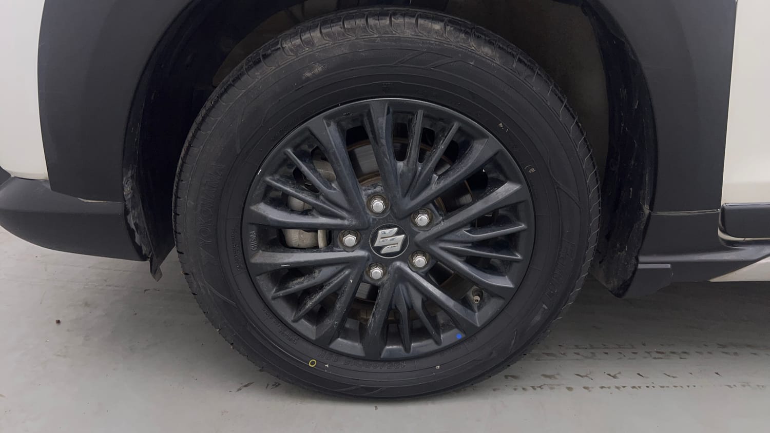 Used 2021 Maruti Suzuki XL6 Zeta MT Petrol Petrol Manual tyres LEFT FRONT TYRE RIM VIEW