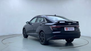 Used 2025 Hyundai Verna SX (O) 1.5 Turbo Petrol DCT Petrol Automatic exterior LEFT REAR CORNER VIEW