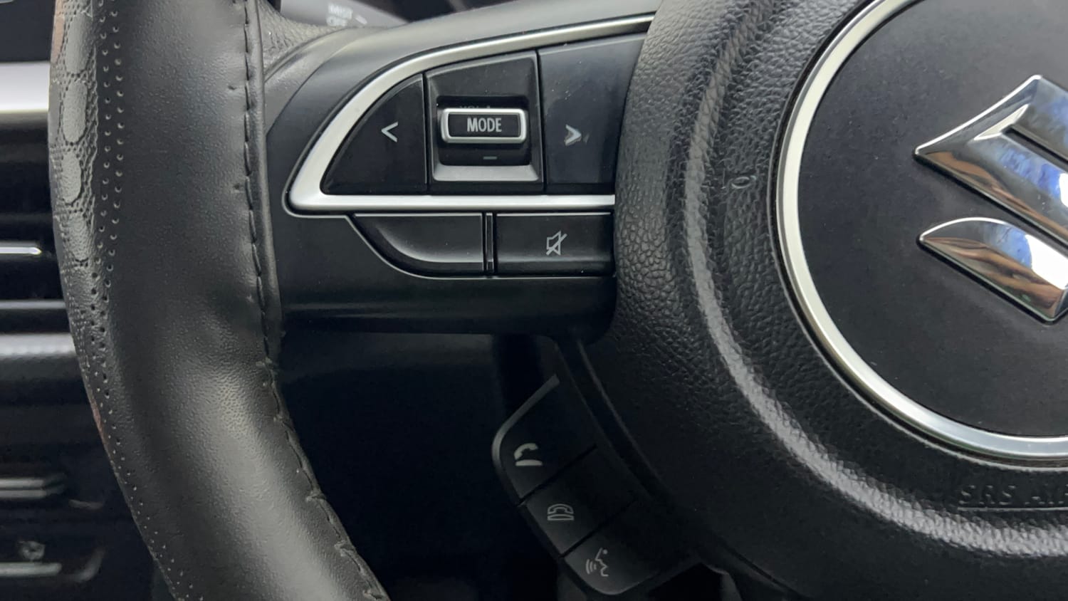 Used 2023 Maruti Suzuki Brezza VXi Petrol Manual top_features Steering mounted controls