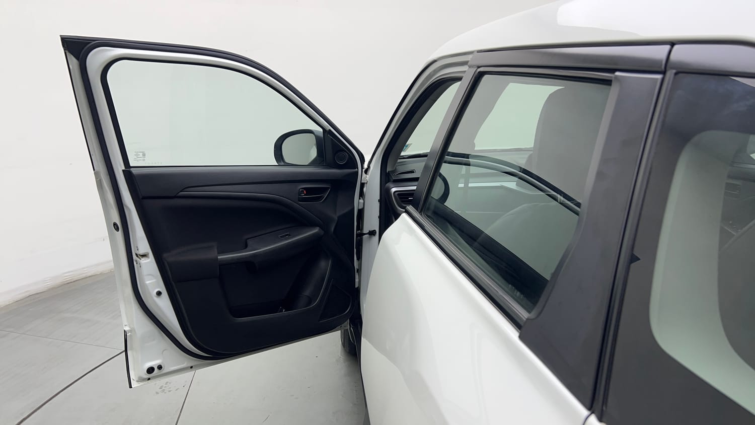 Used 2023 Maruti Suzuki Brezza VXi Petrol Manual interior LEFT FRONT DOOR OPEN VIEW