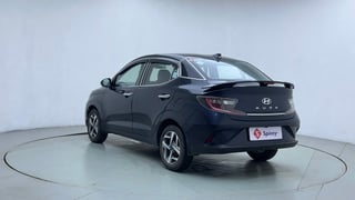 Used 2024 Hyundai Aura SX 1.2 CNG Cng Manual exterior LEFT REAR CORNER VIEW