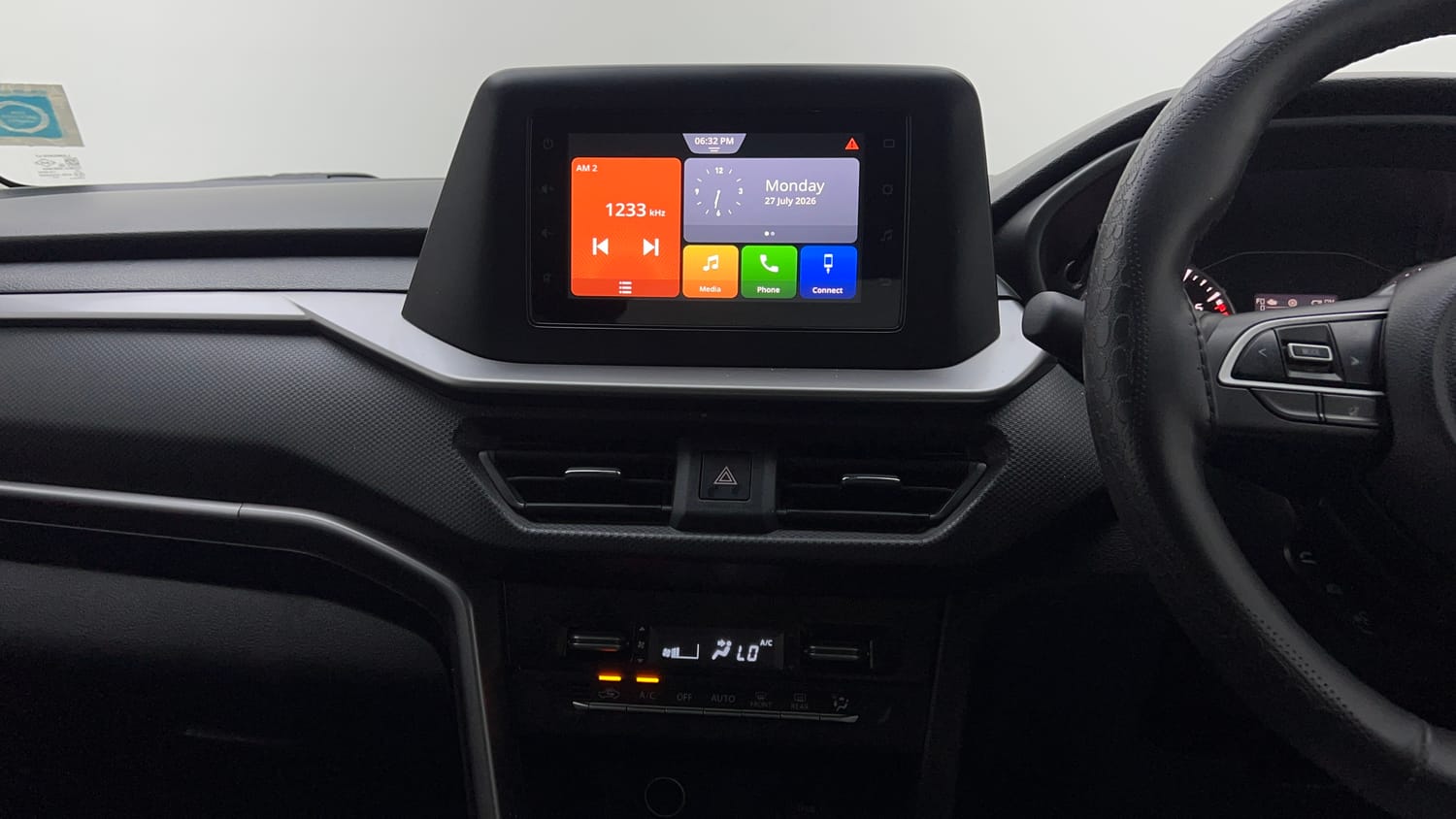 Used 2023 Maruti Suzuki Brezza VXi Petrol Manual top_features Integrated (in-dash) music system
