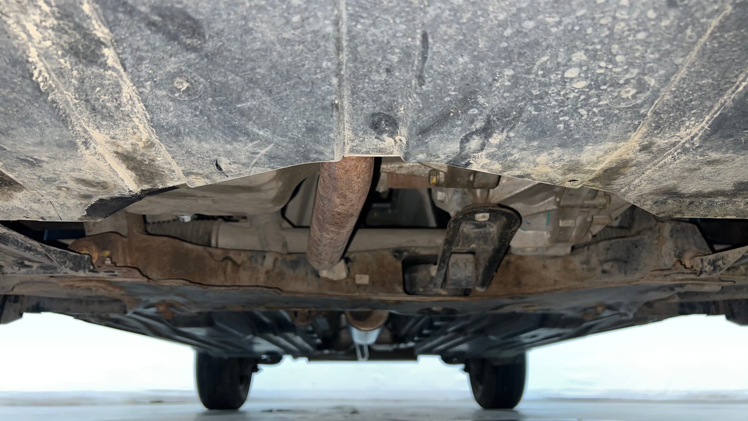Used 2023 Maruti Suzuki Brezza VXi Petrol Manual extra FRONT LEFT UNDERBODY VIEW