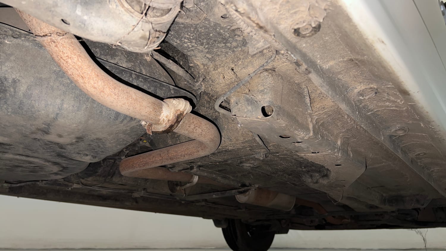 Used 2021 Tata Tigor XZ Plus Petrol Manual extra REAR RIGHT UNDERBODY VIEW