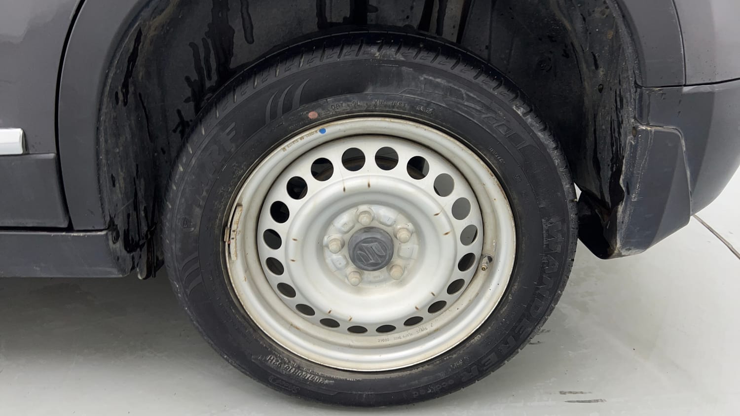 Used 2021 maruti-suzuki Vitara Brezza LXi Petrol Manual tyres LEFT REAR TYRE RIM VIEW