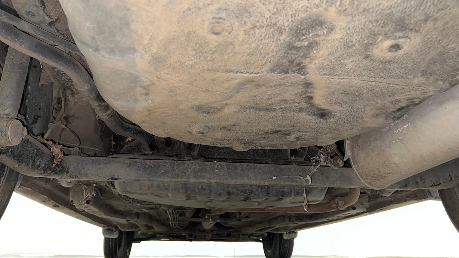 Used 2021 Tata Tigor XZ Plus Petrol Manual extra REAR UNDERBODY VIEW (TAKEN FROM REAR)