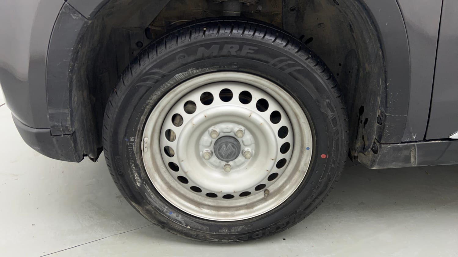 Used 2021 maruti-suzuki Vitara Brezza LXi Petrol Manual tyres LEFT FRONT TYRE RIM VIEW