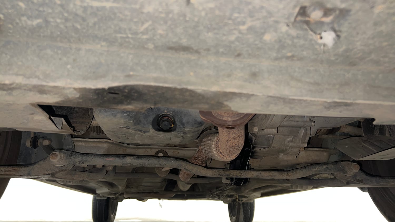Used 2021 Tata Tigor XZ Plus Petrol Manual extra FRONT LEFT UNDERBODY VIEW