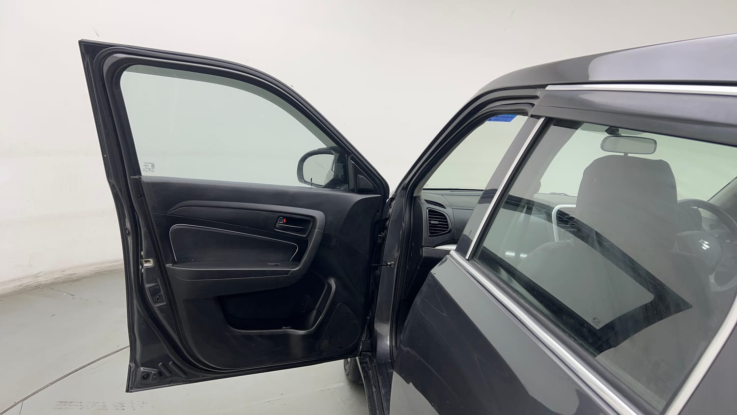 Used 2021 maruti-suzuki Vitara Brezza LXi Petrol Manual interior LEFT FRONT DOOR OPEN VIEW
