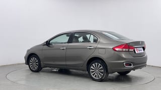 Used 2022 Maruti Suzuki Ciaz Alpha 1.5 AT Petrol Automatic exterior LEFT REAR CORNER VIEW