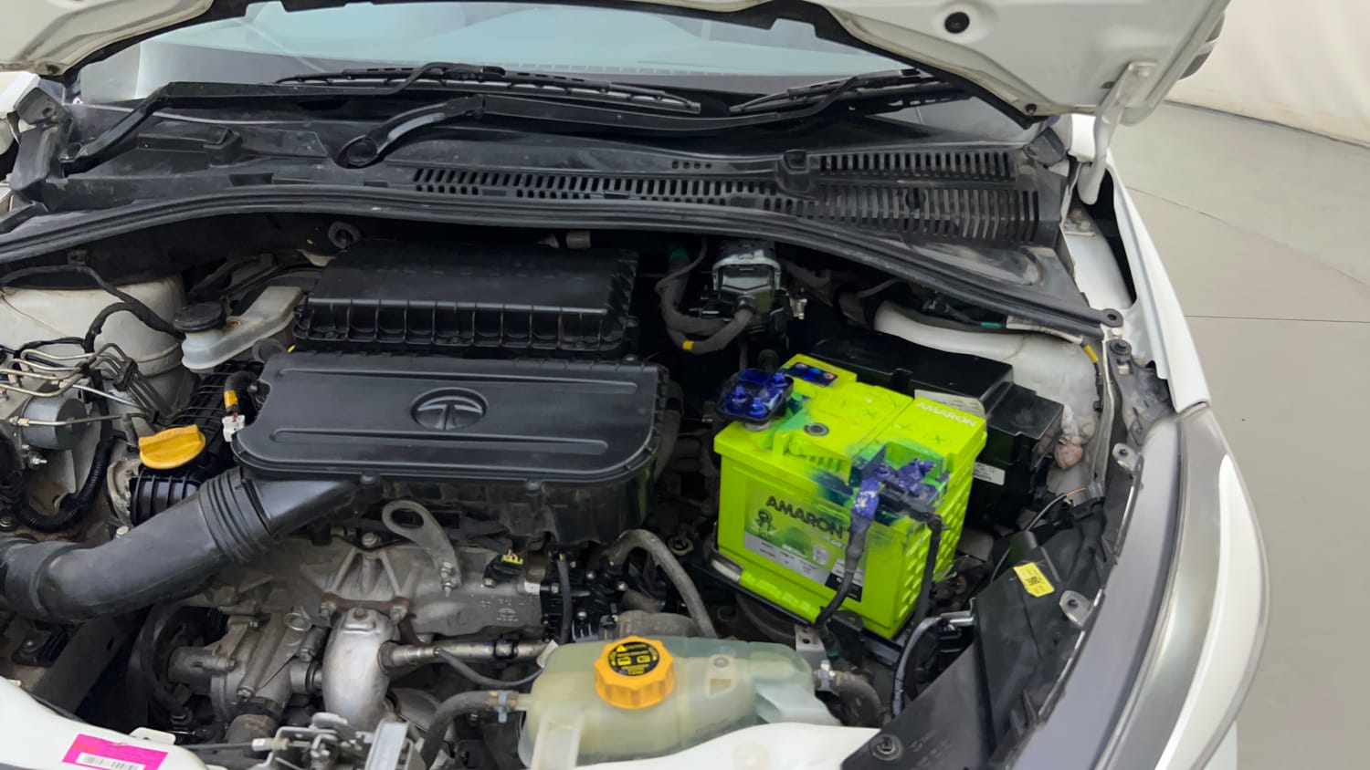 Used 2021 Tata Tigor XZ Plus Petrol Manual engine ENGINE LEFT SIDE HINGE & APRON VIEW