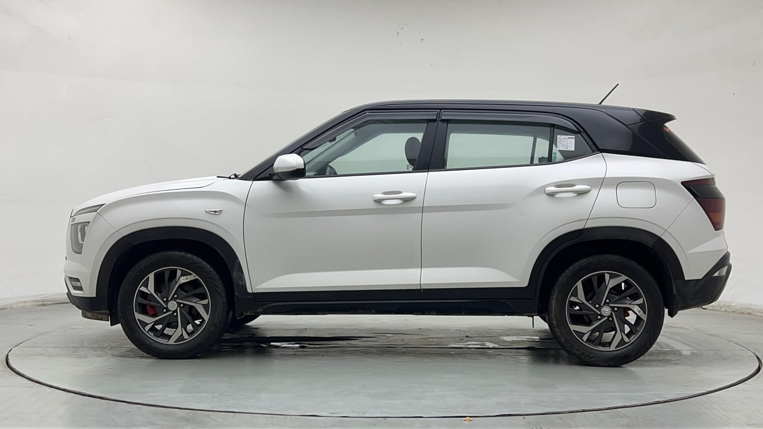 Used 2023 Hyundai Creta E 1.5 Petrol Petrol Manual exterior LEFT SIDE VIEW