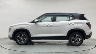 Used 2023 Hyundai Creta E 1.5 Petrol Petrol Manual exterior LEFT SIDE VIEW