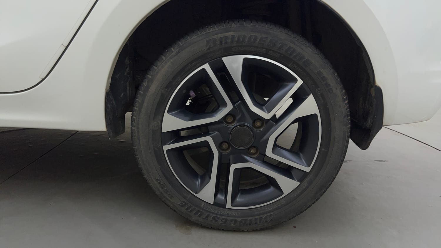 Used 2021 Tata Tigor XZ Plus Petrol Manual tyres LEFT REAR TYRE RIM VIEW