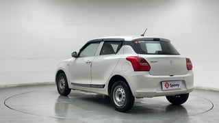 Used 2024 Maruti Suzuki Swift LXi Petrol Manual exterior LEFT REAR CORNER VIEW
