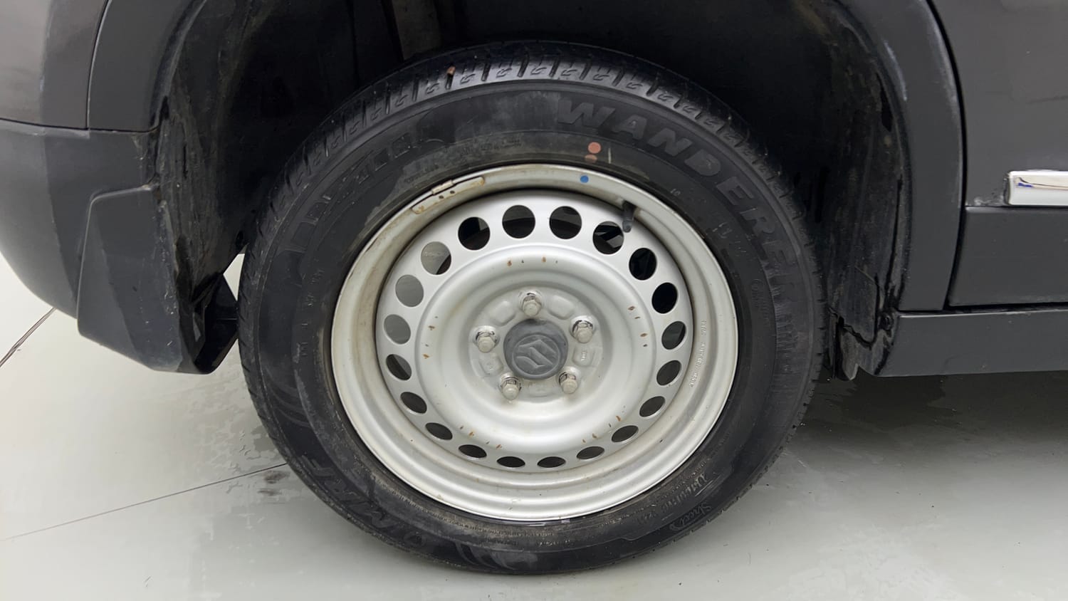 Used 2021 maruti-suzuki Vitara Brezza LXi Petrol Manual tyres RIGHT REAR TYRE RIM VIEW