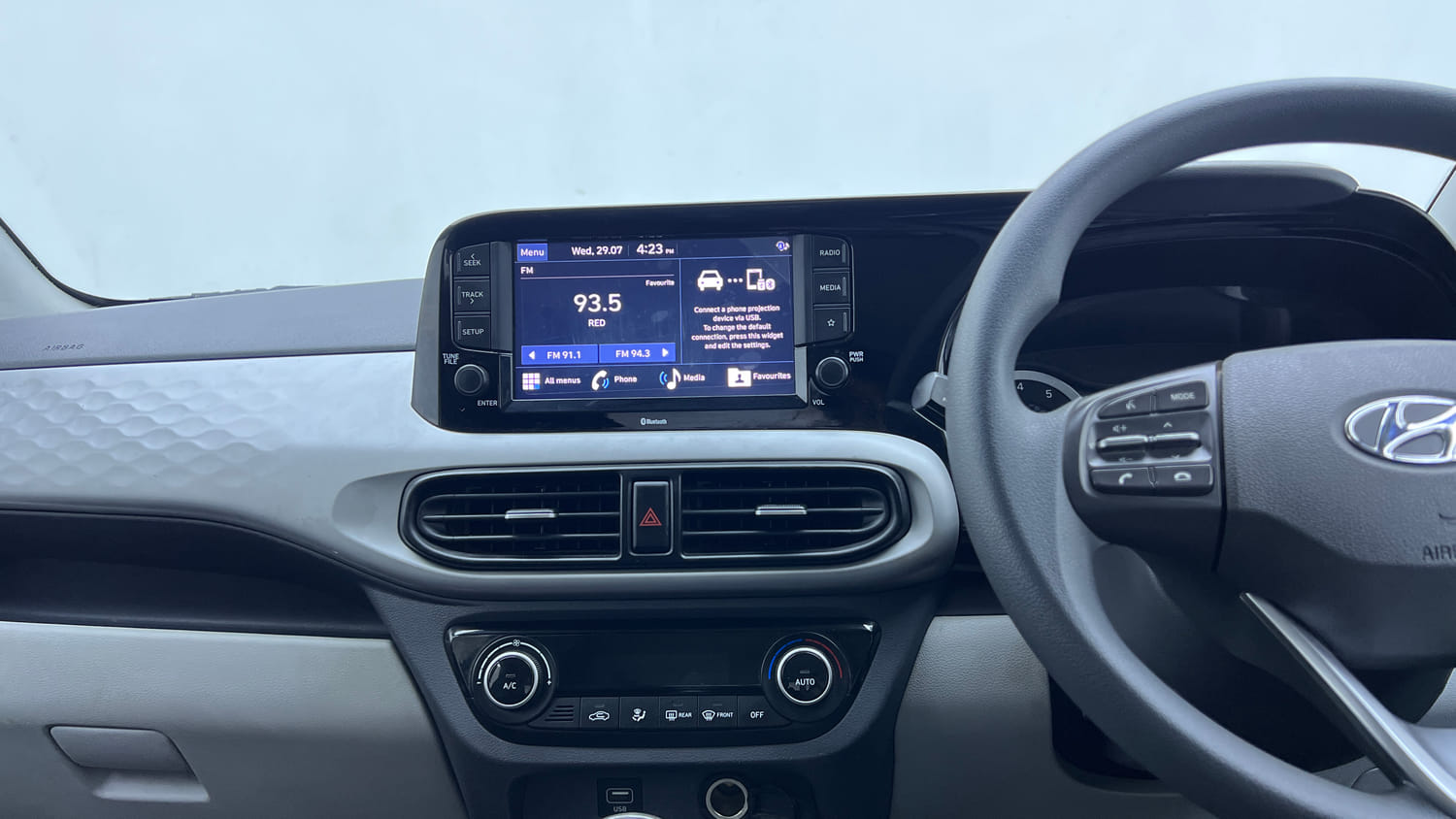 Used 2022 Hyundai Grand i10 Nios Sportz 1.2 Kappa VTVT CNG Cng Manual interior MUSIC SYSTEM & AC CONTROL VIEW