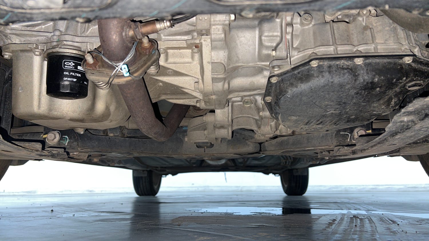 Used 2021 Maruti Suzuki Baleno Zeta Automatic Petrol Automatic extra FRONT LEFT UNDERBODY VIEW
