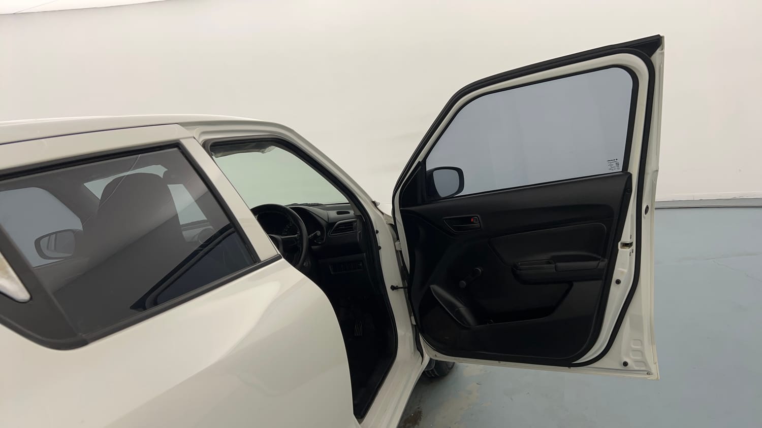 Used 2020 Maruti Suzuki Swift LXi Petrol Manual interior RIGHT FRONT DOOR OPEN VIEW