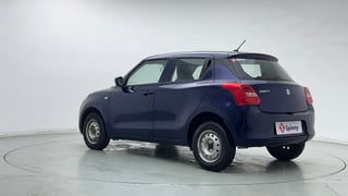 Used 2019 Maruti Suzuki Swift LXi Petrol Manual exterior LEFT REAR CORNER VIEW