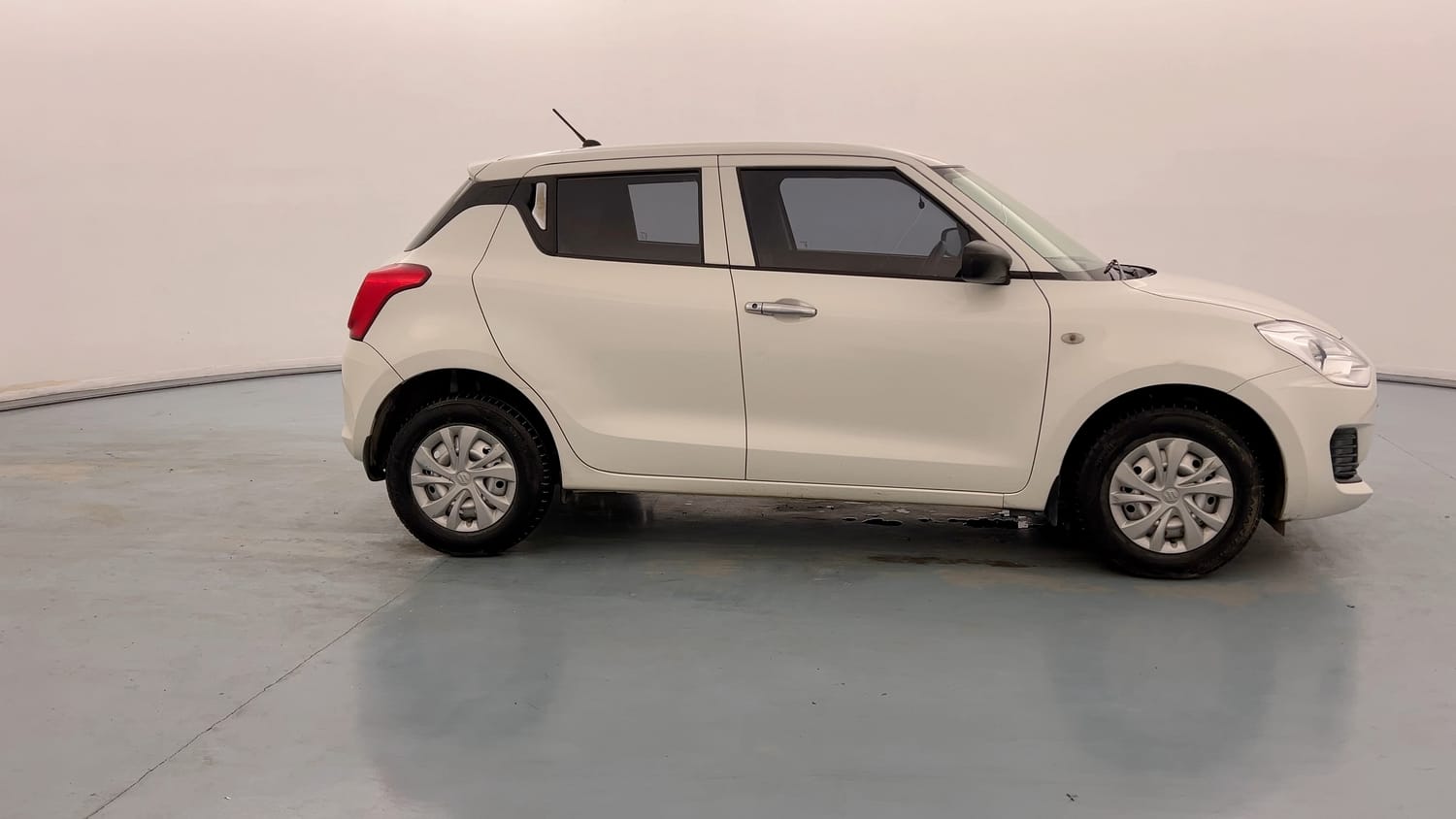Used 2020 Maruti Suzuki Swift LXi Petrol Manual exterior RIGHT SIDE VIEW