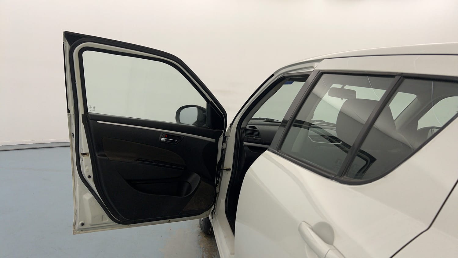 Used 2017 Maruti Suzuki Swift VXI (O) Petrol Manual interior LEFT FRONT DOOR OPEN VIEW