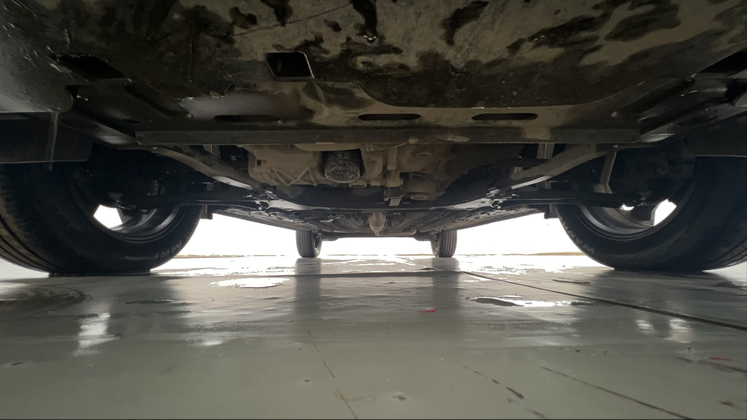 Used 2022 Renault Kiger RXZ AMT Petrol Automatic extra FRONT LEFT UNDERBODY VIEW